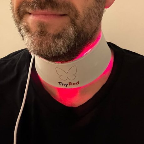ThyRed collar worn at home
