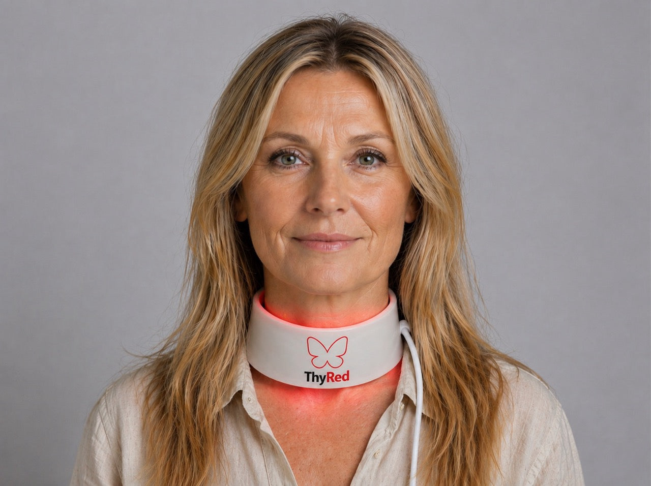 ThyRed worn at the base of the neck