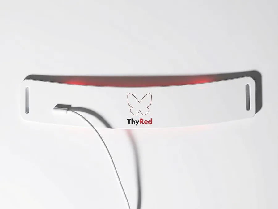 The ThyRed collar lying flat with its cable